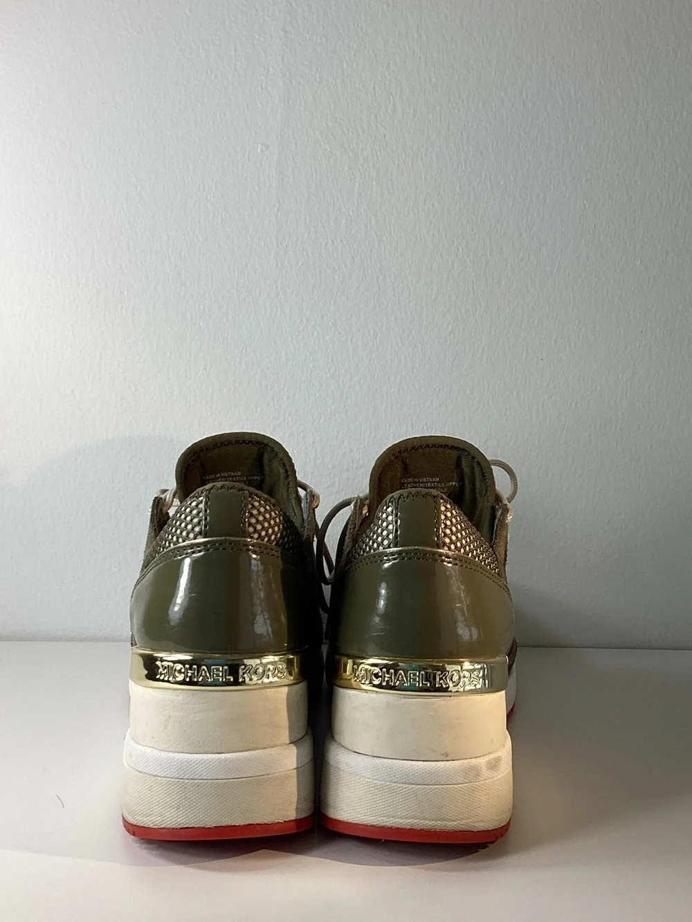 MICHAEL Michael Kors women’s Olive Green Sneakers with Red Soles
